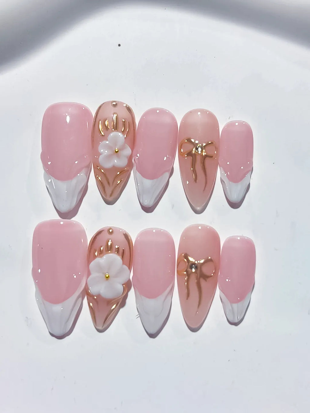 Pink White Gold French tip Flower Bow Metallic Charm press on nails detail view