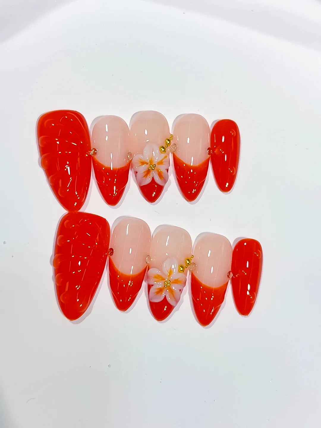 Nude Red Gold French tip Flower Shell press on nails detail view