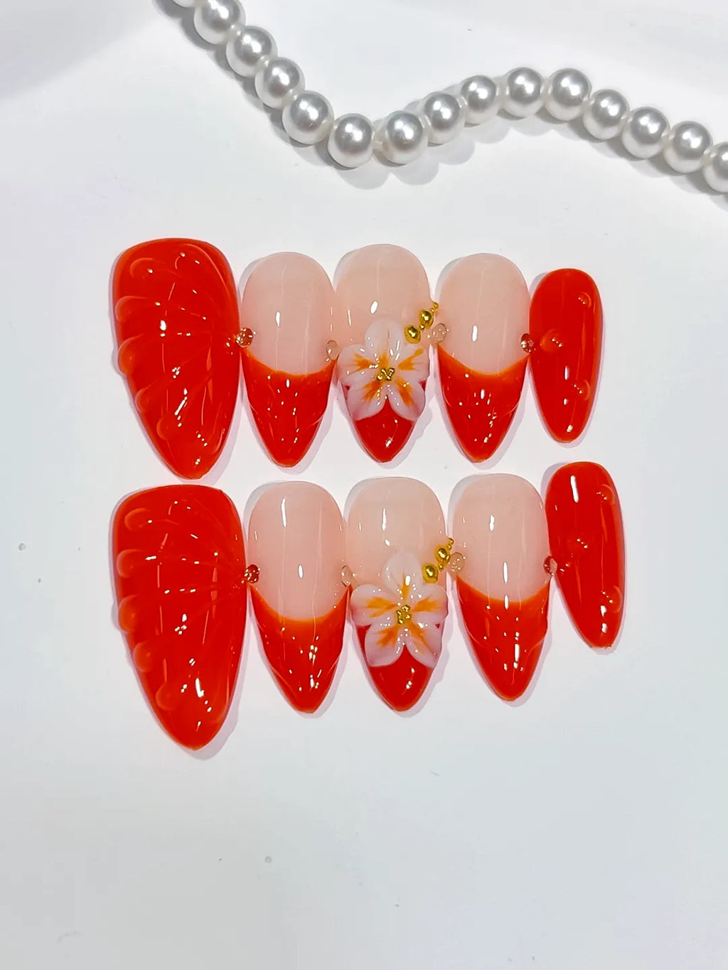 Nude Red Gold French tip Flower Shell press on nails detail view