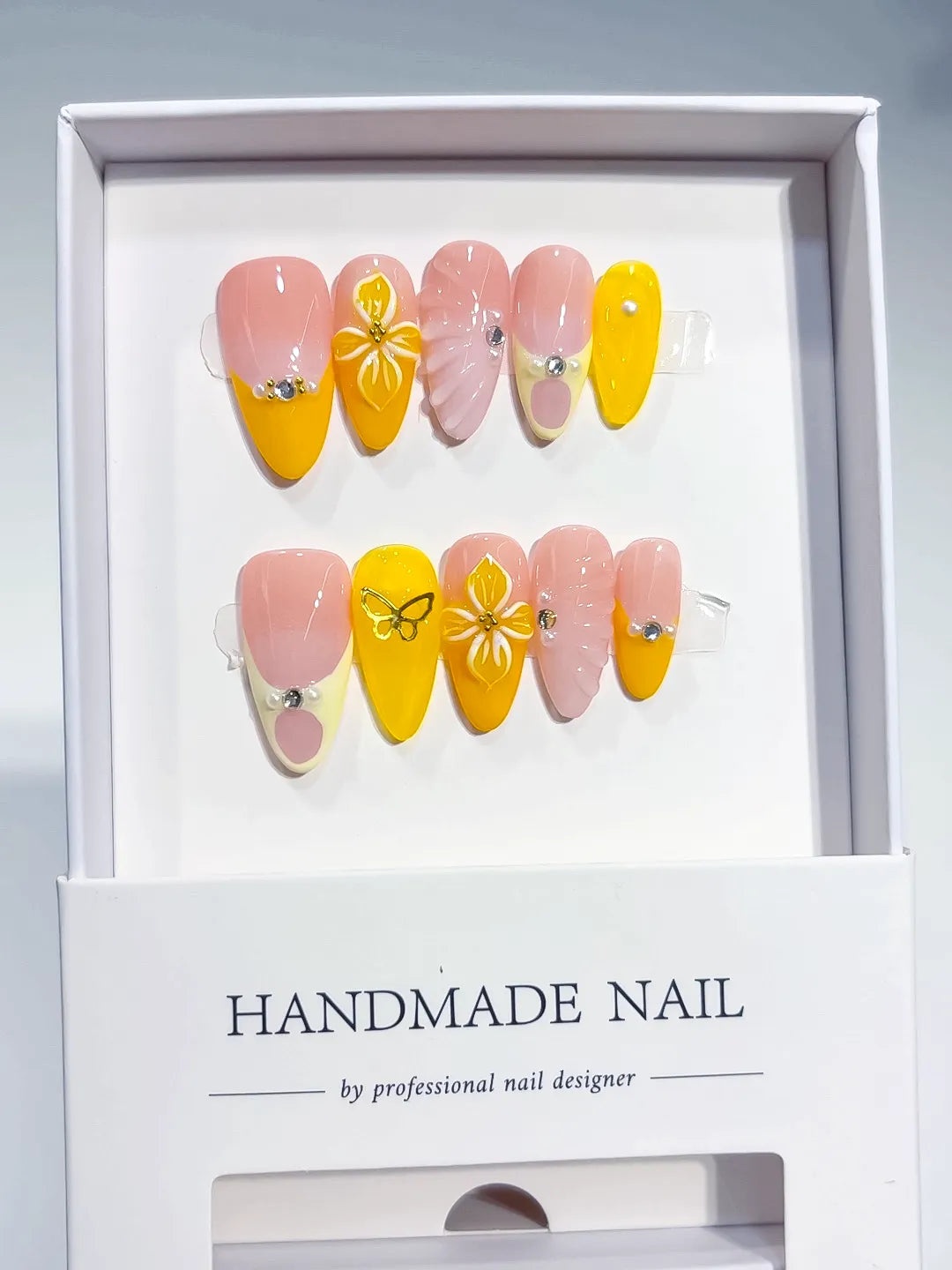 Nude Yellow Pink French tip Flower Rhinestone Heart press on nails close up