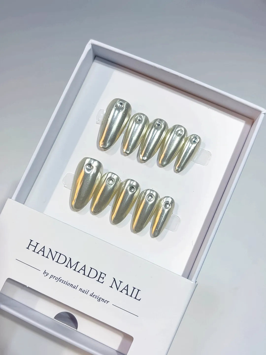 handmade press on nails long almond silver glitter with rhinestone centerpiece