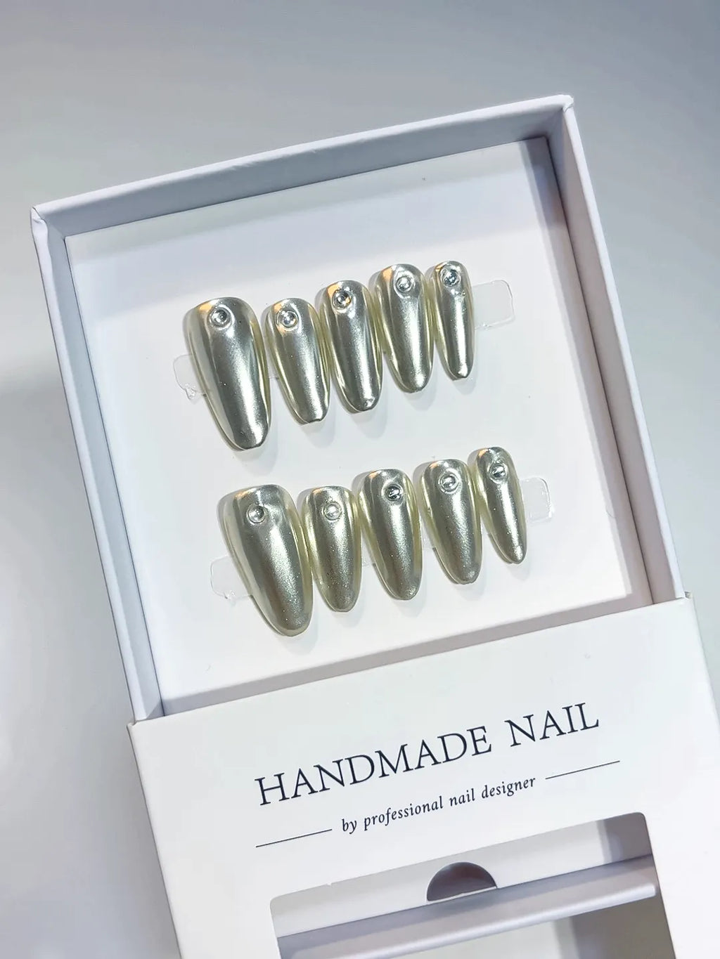 handmade press on nails long almond silver glitter with rhinestone centerpiece