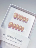 Handmade press on nails short almond nude with aurora shimmer, centerpiece view