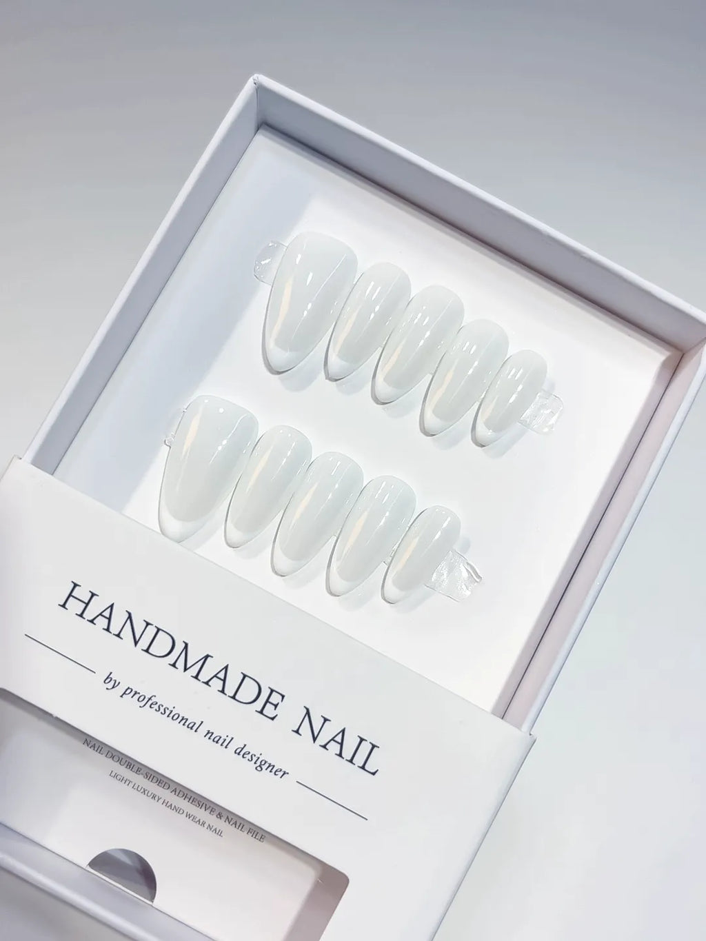 Medium almond white French handmade press on nails, centerpiece view