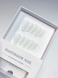 Medium almond white French handmade press on nails, centerpiece view