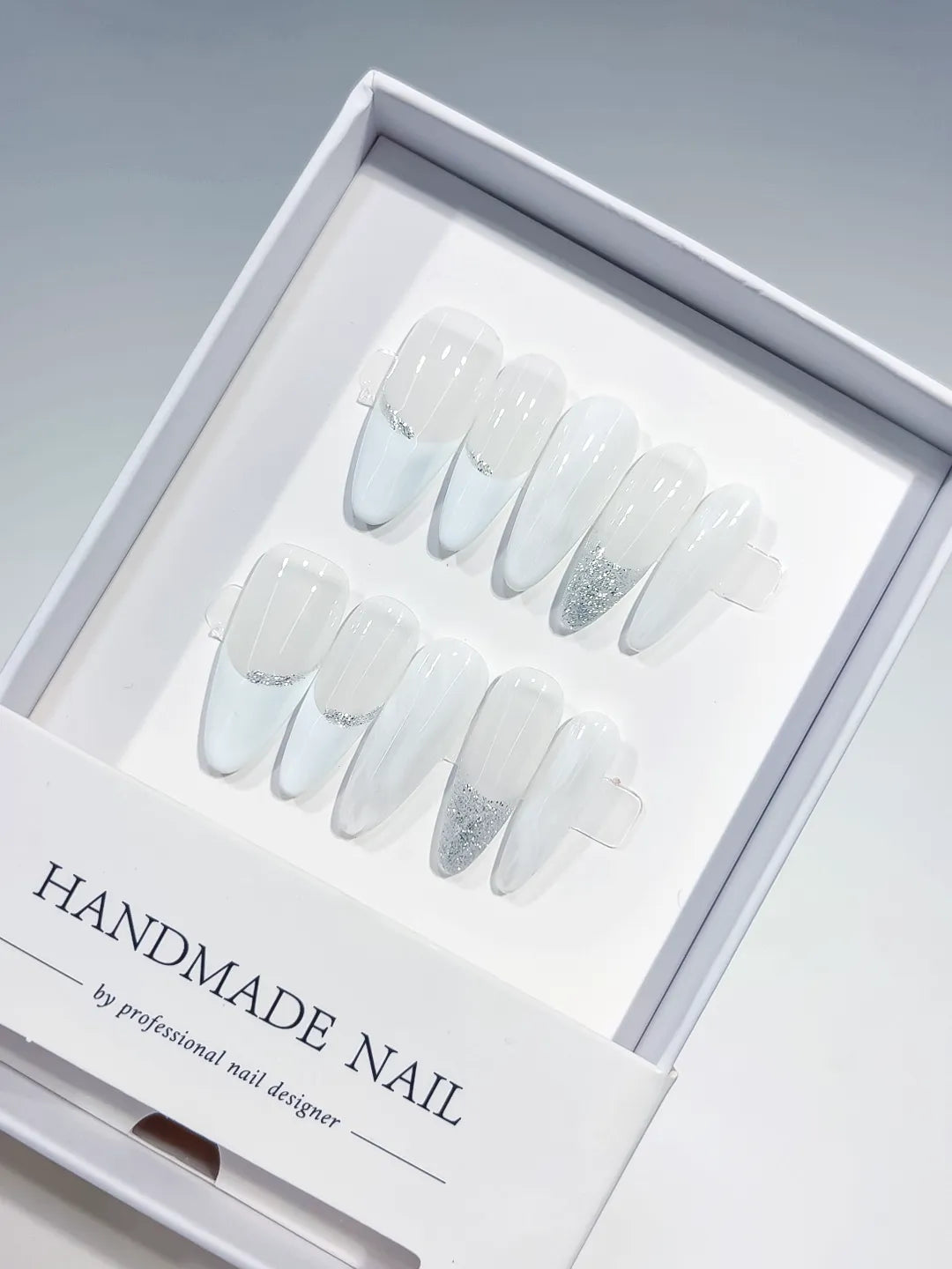 long almond white french handmade press on nails with silver glitter lines, close-up top row