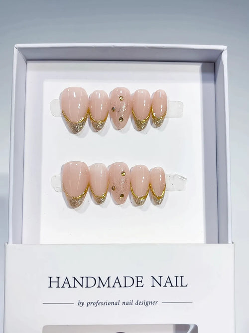 short almond nude with gold french and rhinestones, handmade press on nails centerpiece