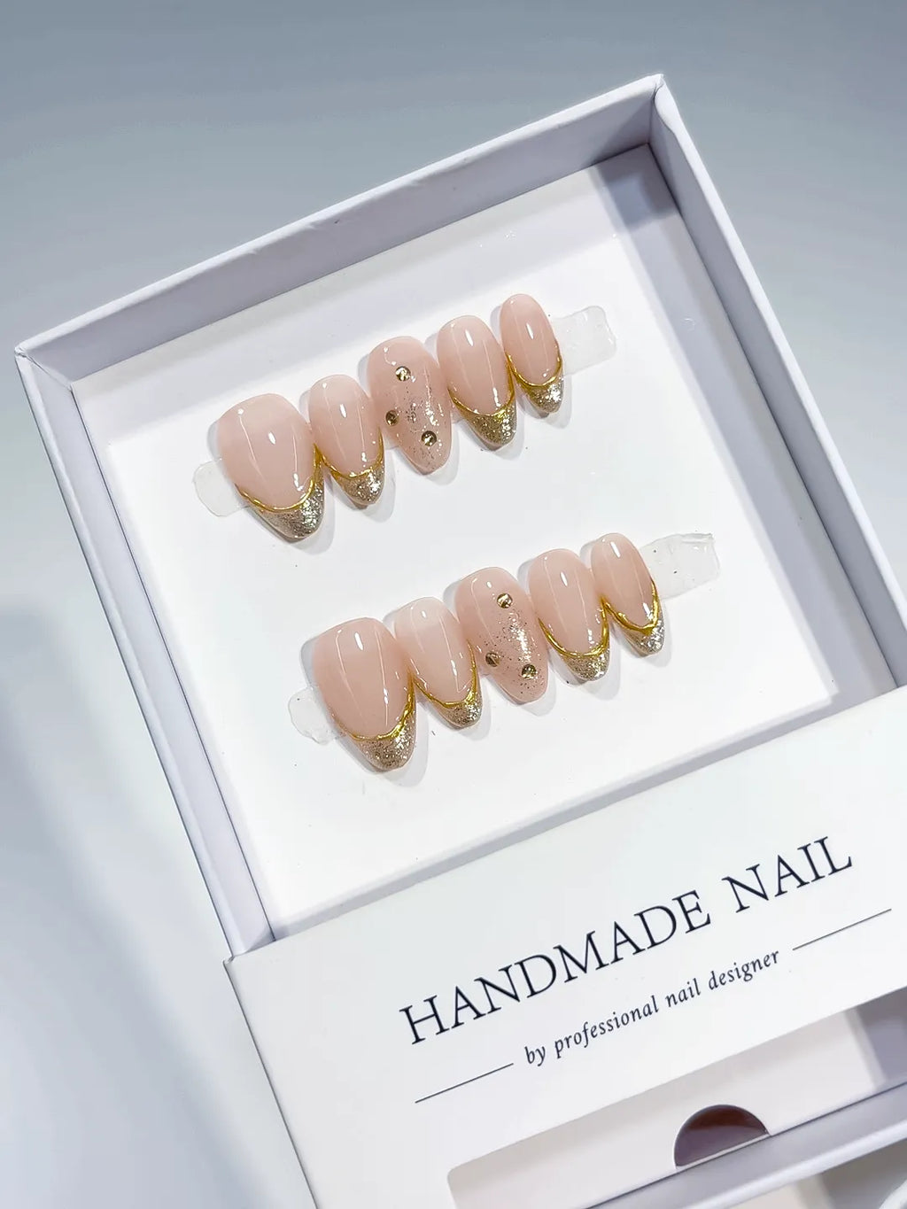 short almond nude with gold french and rhinestones, handmade press on nails centerpiece