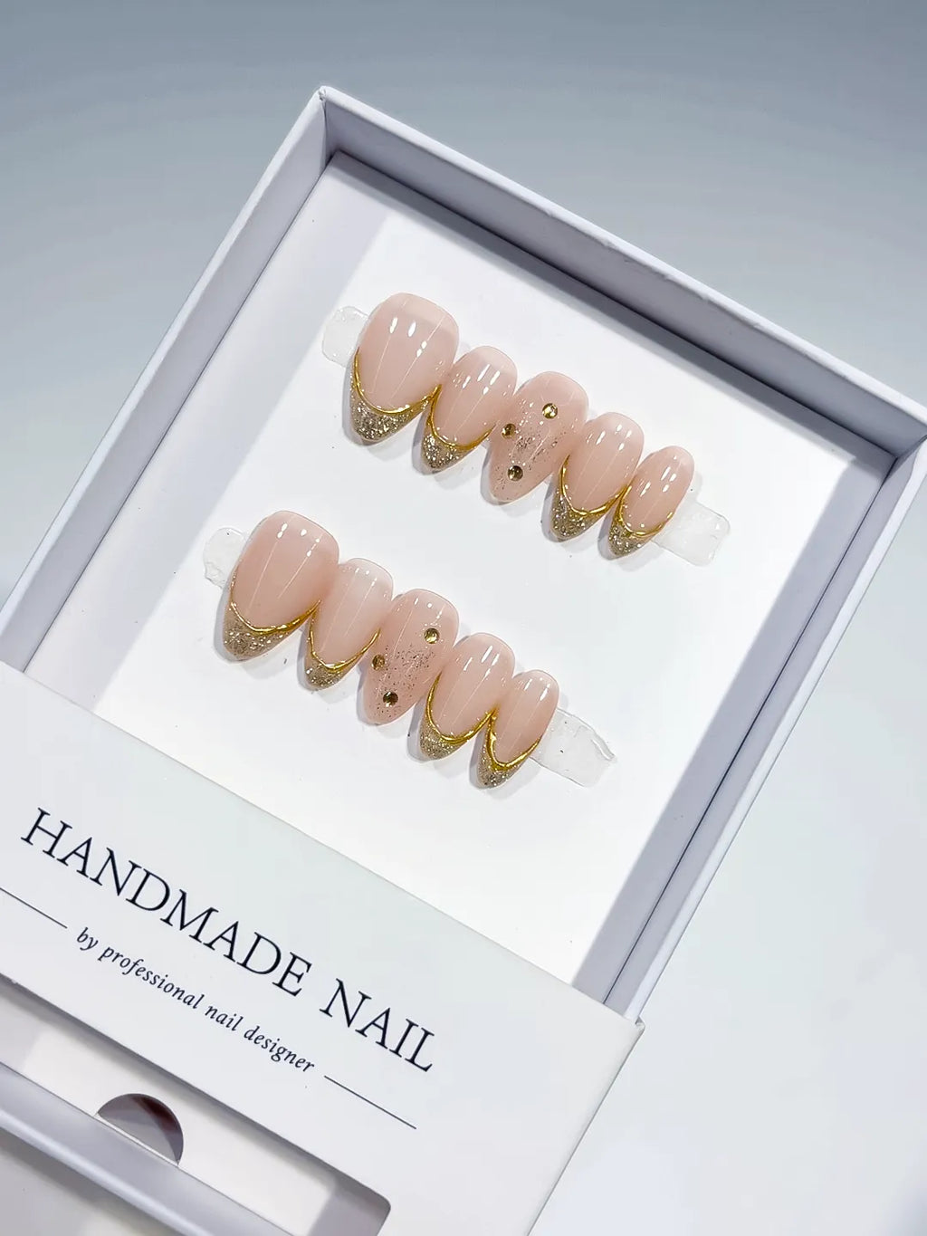 short almond nude with gold french and rhinestones, handmade press on nails centerpiece