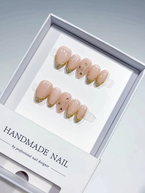 short almond nude with gold french and rhinestones, handmade press on nails centerpiece