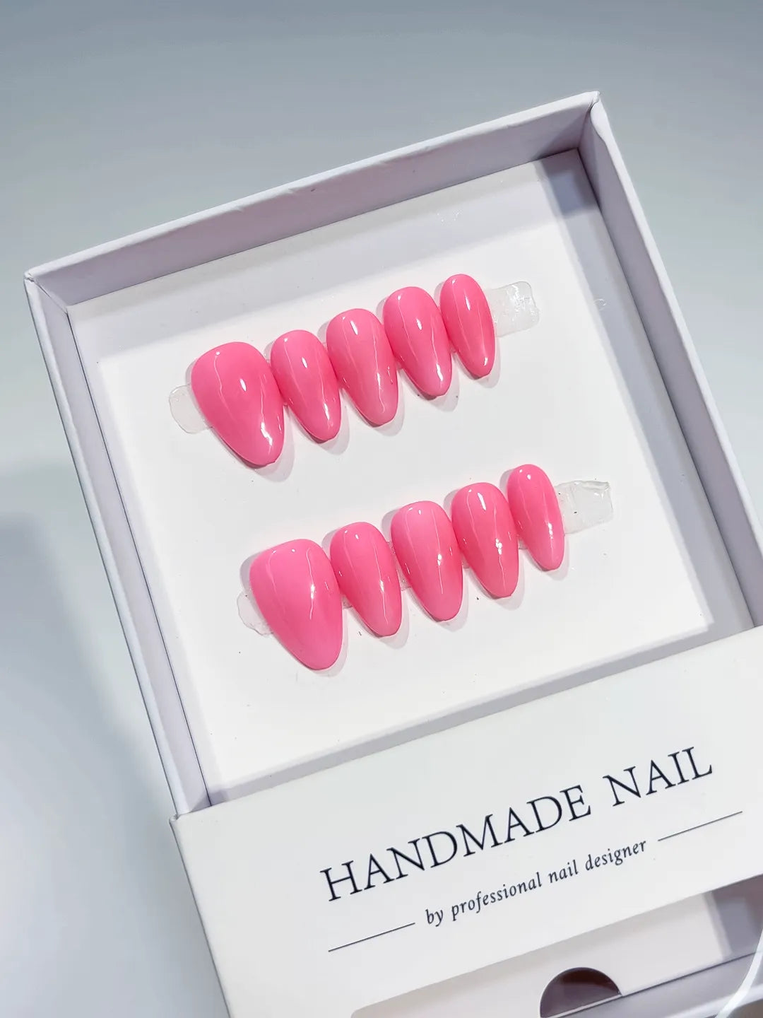 Pink Solid color press on nails angled view