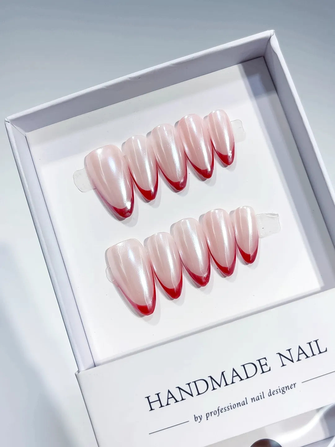 White Pink Red French tip Pearl Sheen press on nails angled view
