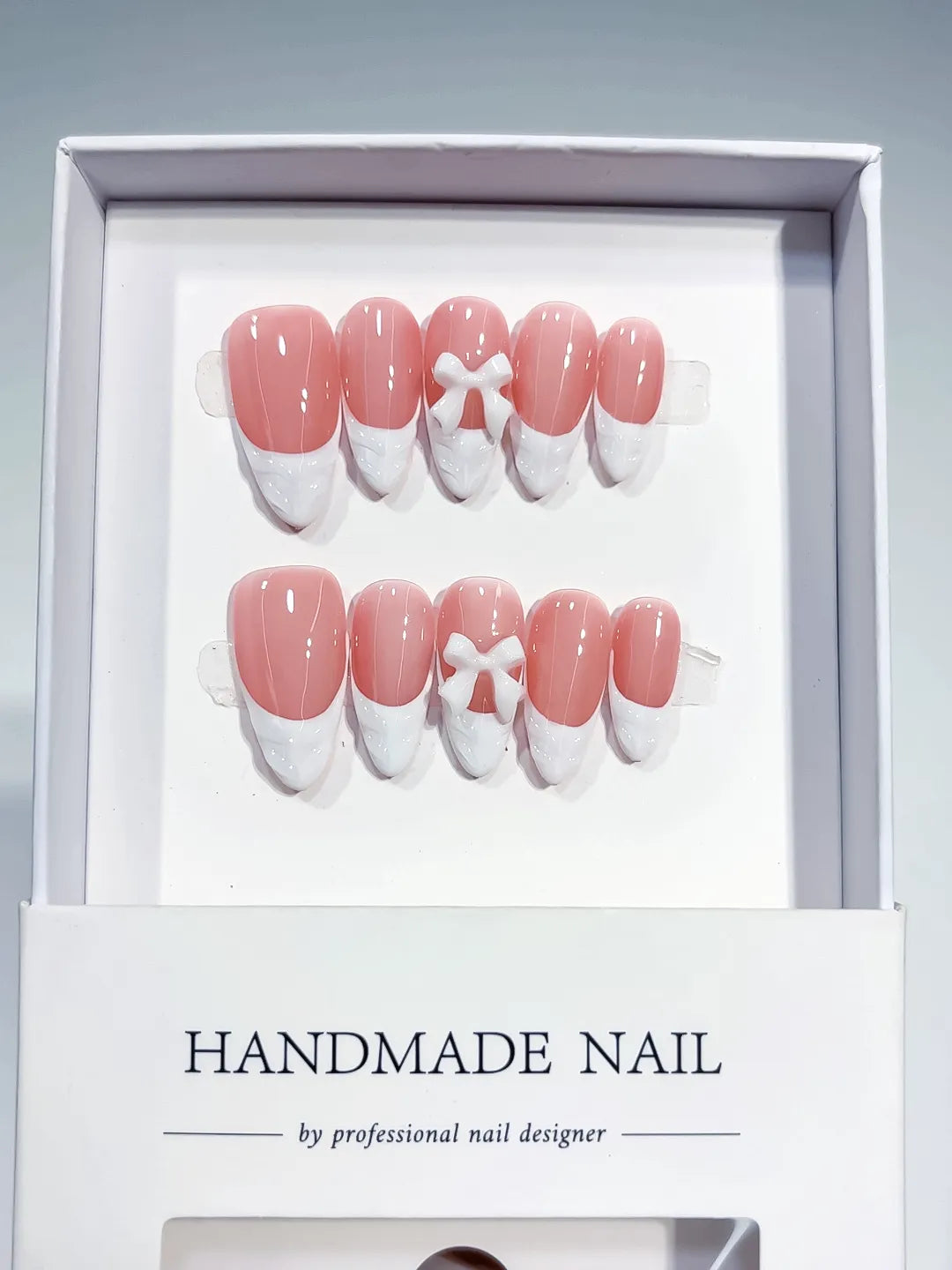 Pink White French tip Bow press on nails full set view