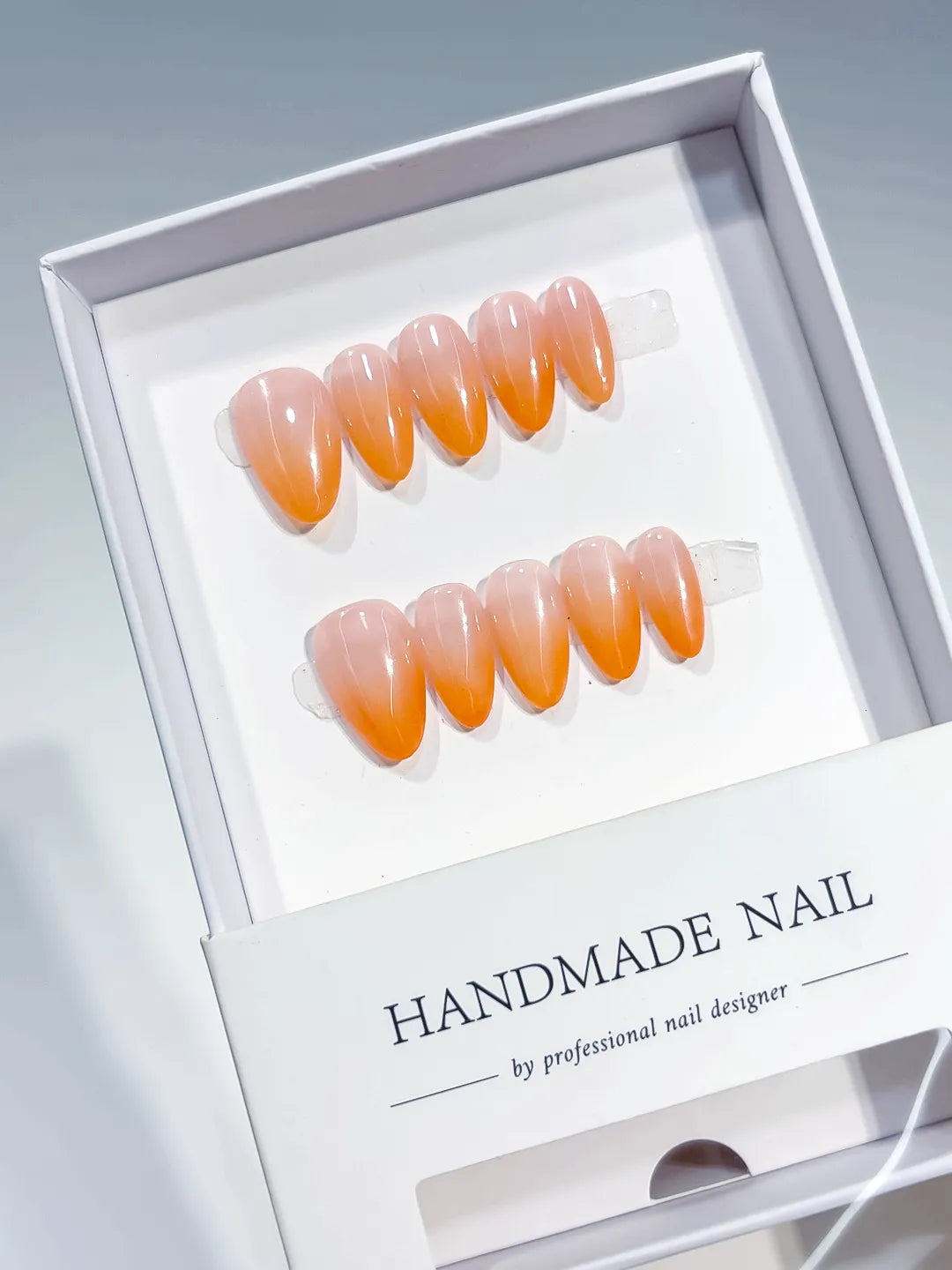 Nude Orange Ombre press on nails full set view