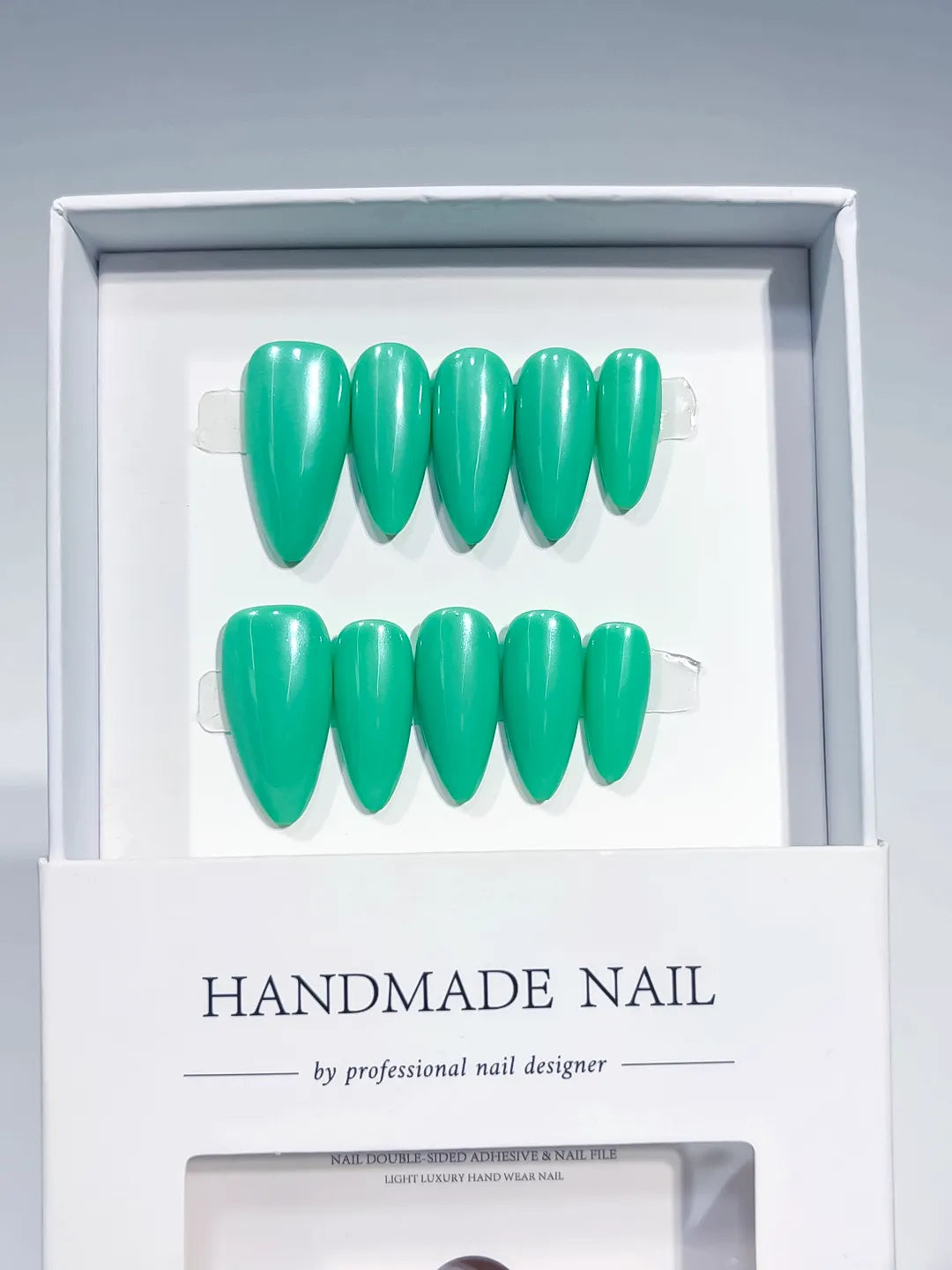 Green Solid color press on nails angled view