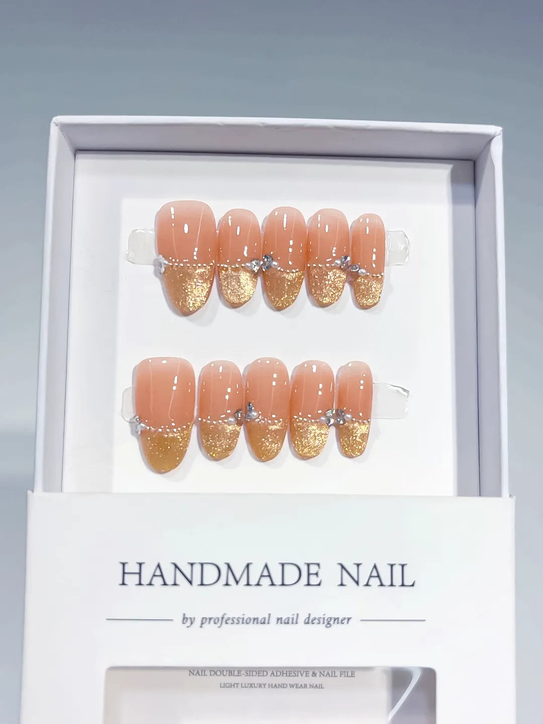Nude Gold Glitter Bow Rhinestone press on nails full set view