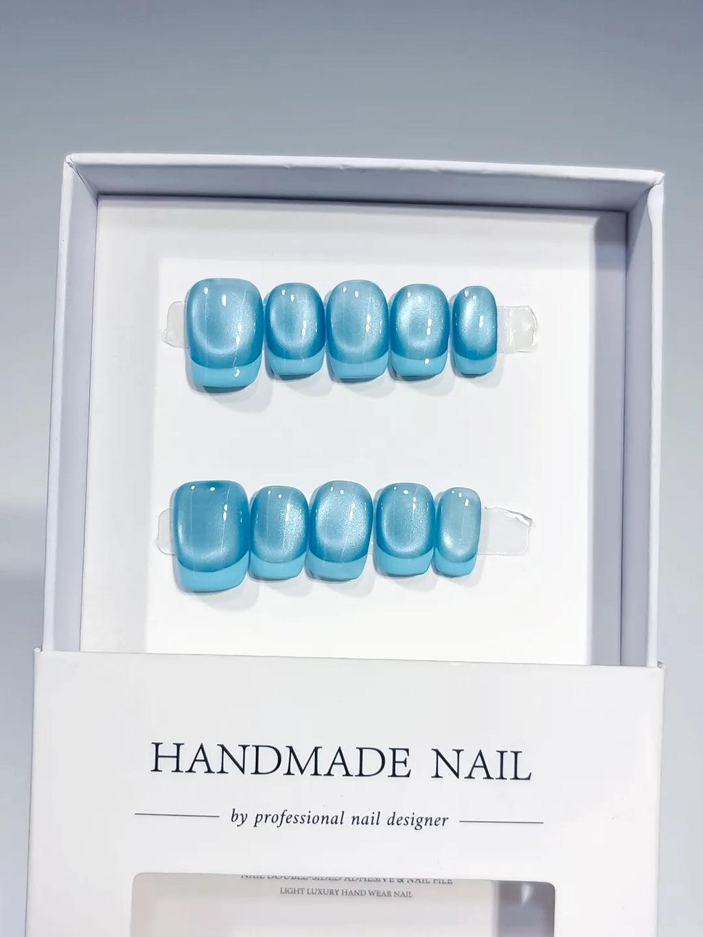 Blue Metallic press on nails angled view