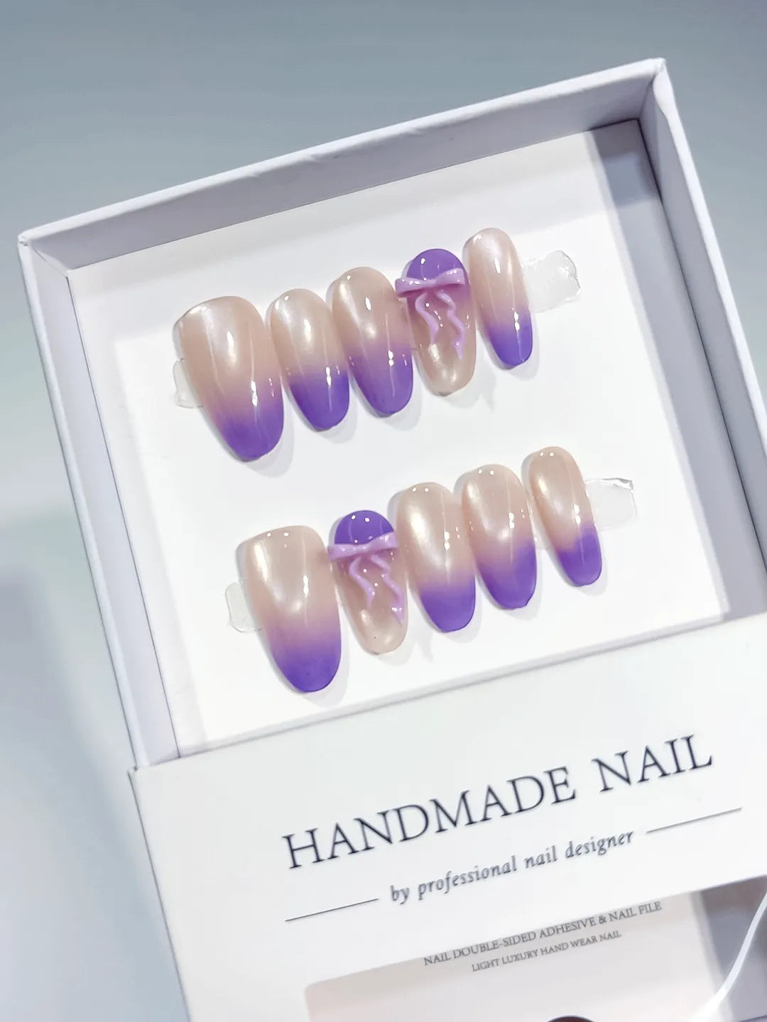 Nude Purple Ombre Bow press on nails angled view