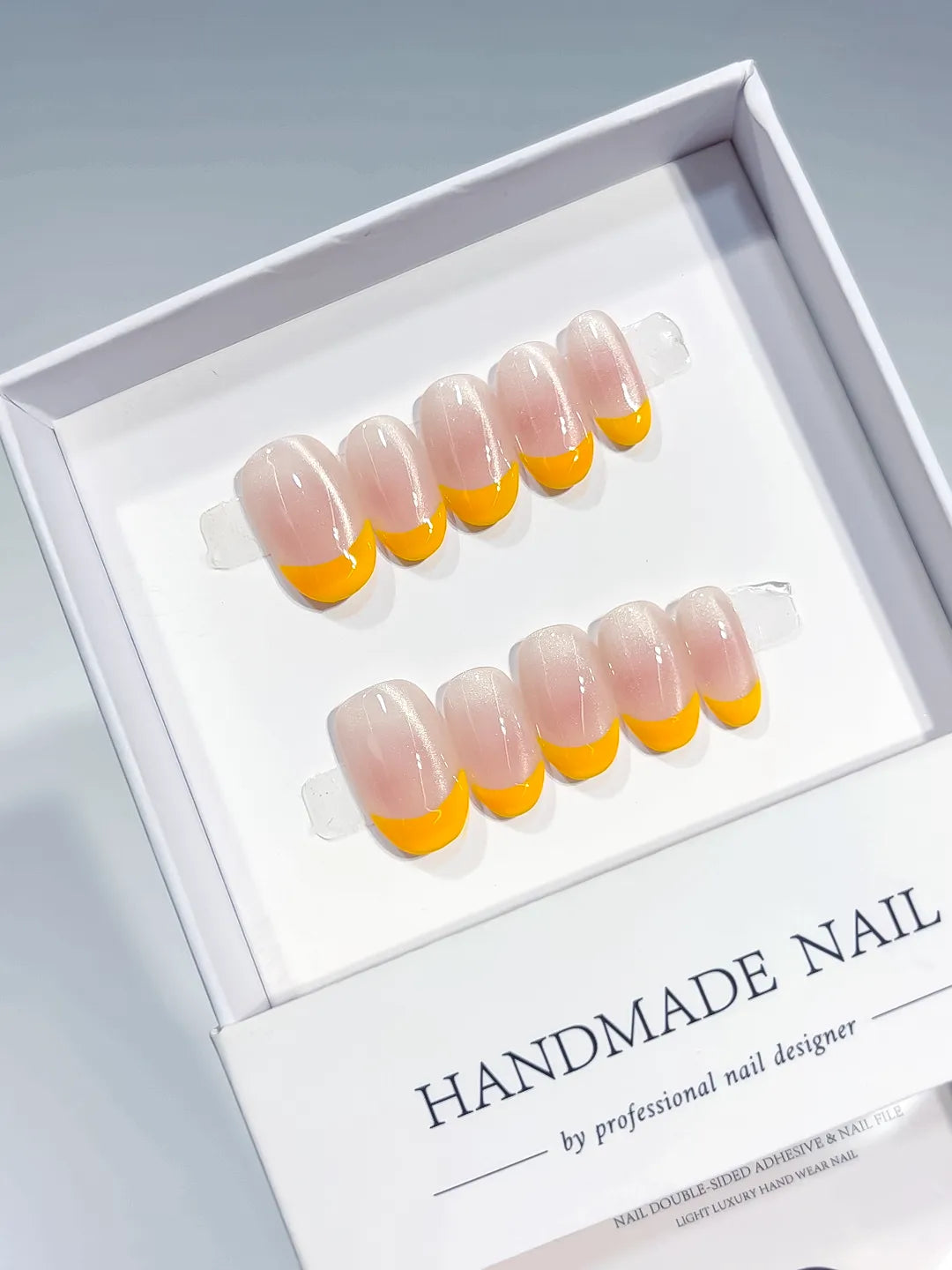 Nude Orange French tip press on nails full set view