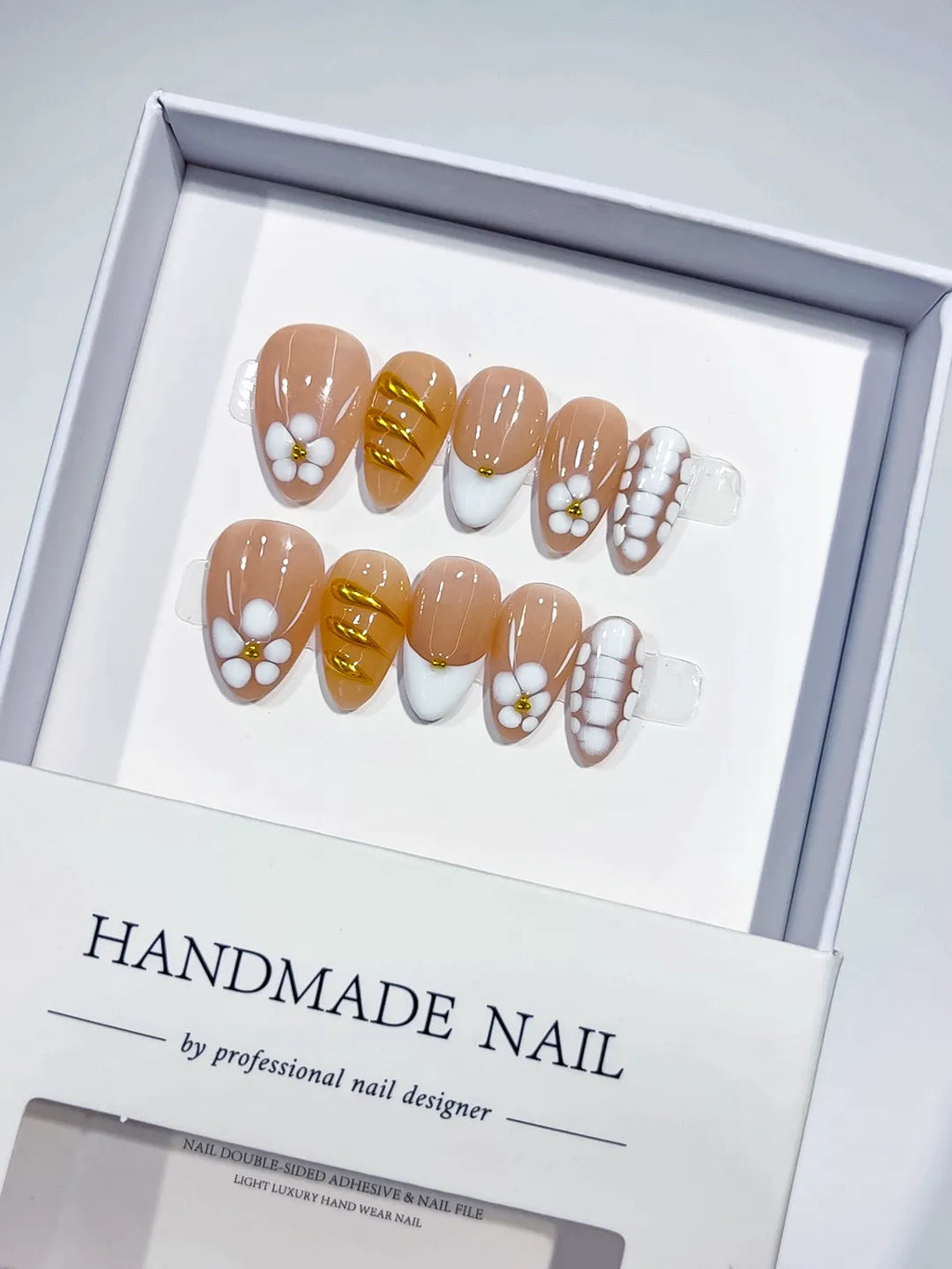 Handmade press on nails short almond nude with 3D flowers centerpiece view