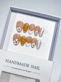 Handmade press on nails short almond nude with 3D flowers centerpiece view