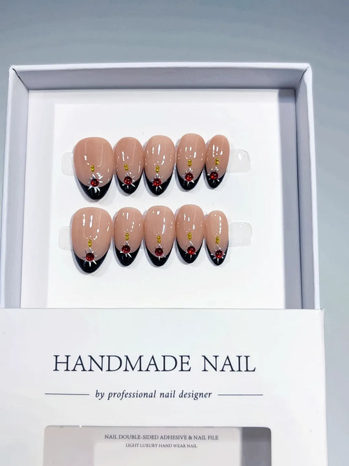 Handmade press on nails short almond nude with French black tips and red rose centerpiece