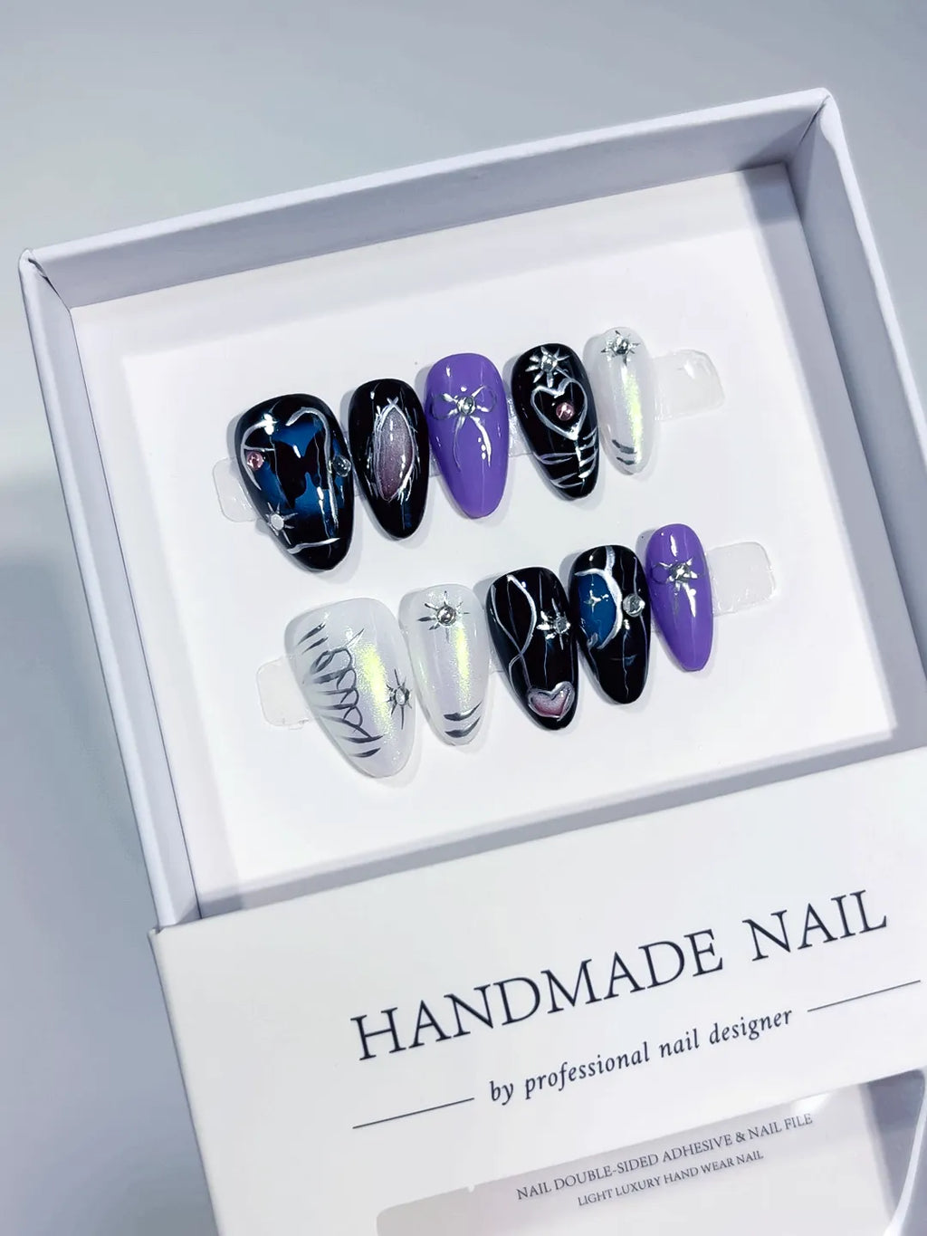 Handmade press on nails short almond black purple with butterfly and heart accents centerpiece
