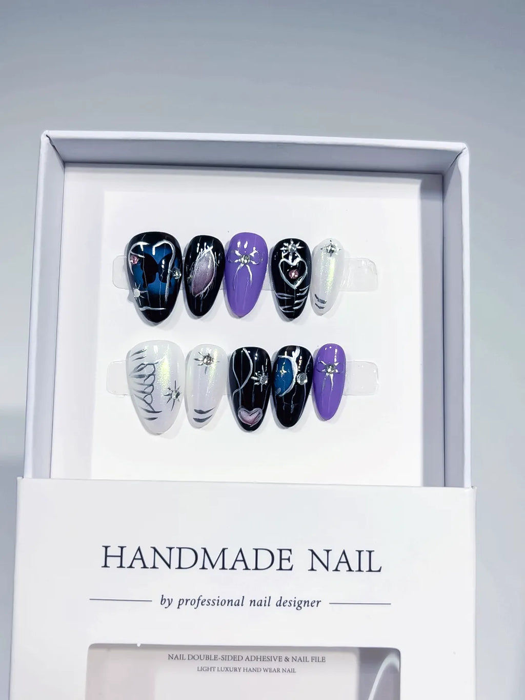 Handmade press on nails short almond black purple with butterfly and heart accents centerpiece
