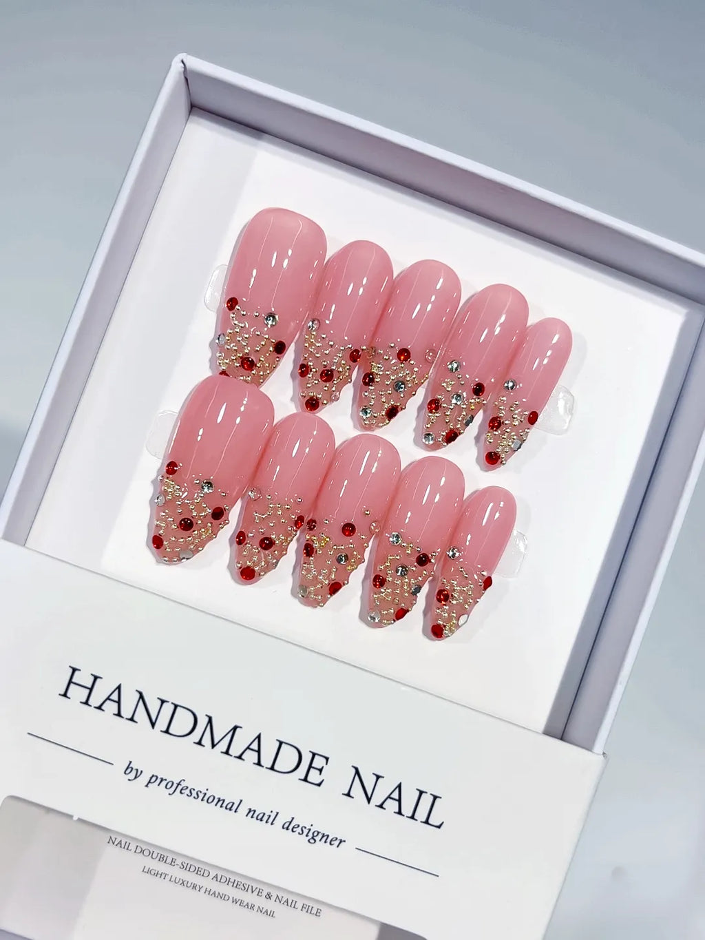 Handmade press on nails long almond pink glitter with rhinestones centerpiece view