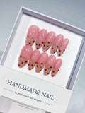 Handmade press on nails long almond pink glitter with rhinestones centerpiece view