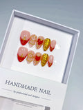 Handmade press on nails short almond nude with red hearts and gold glitter centerpiece