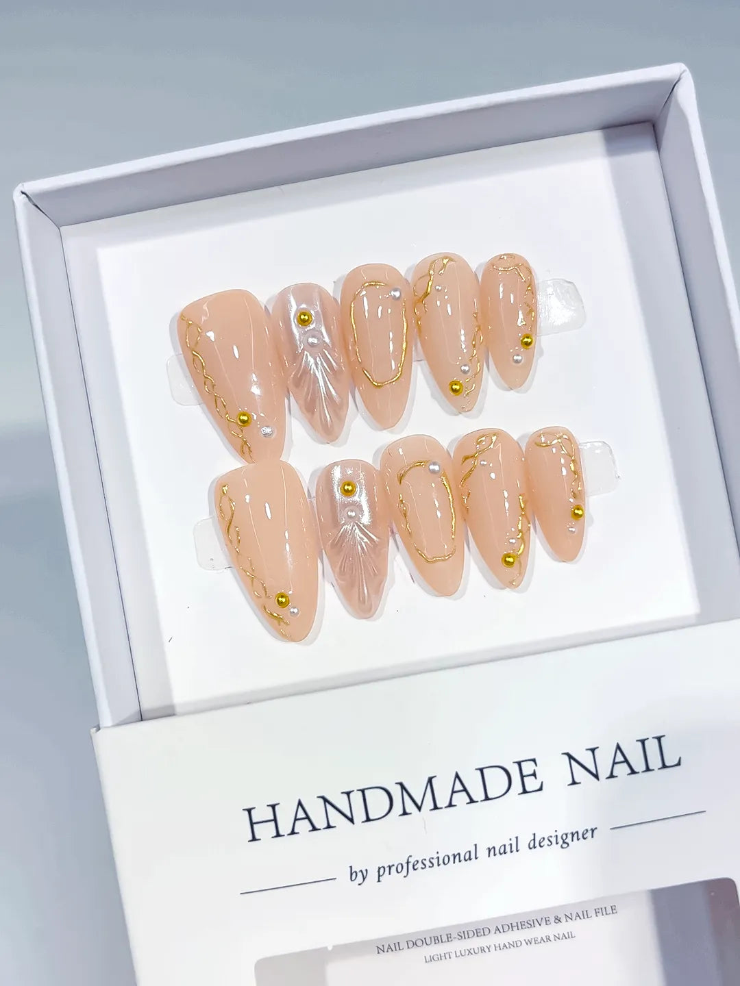 Nude Gold Silver Abstract Pearl Gold Line Gold Stud press on nails full set view