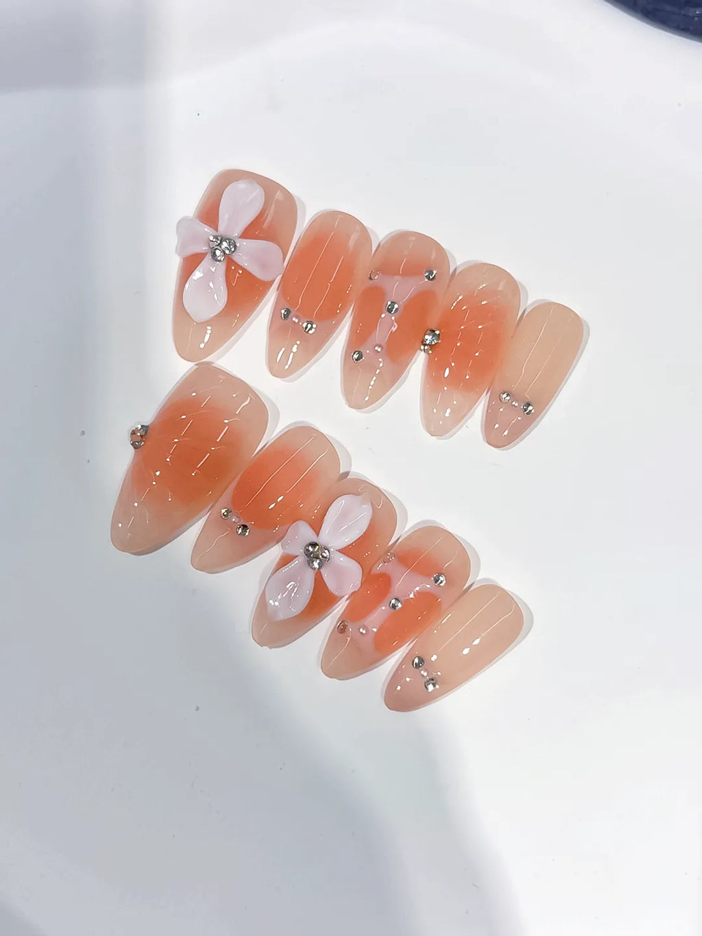 Nude White Silver Ombre Flower Rhinestone press on nails angled view
