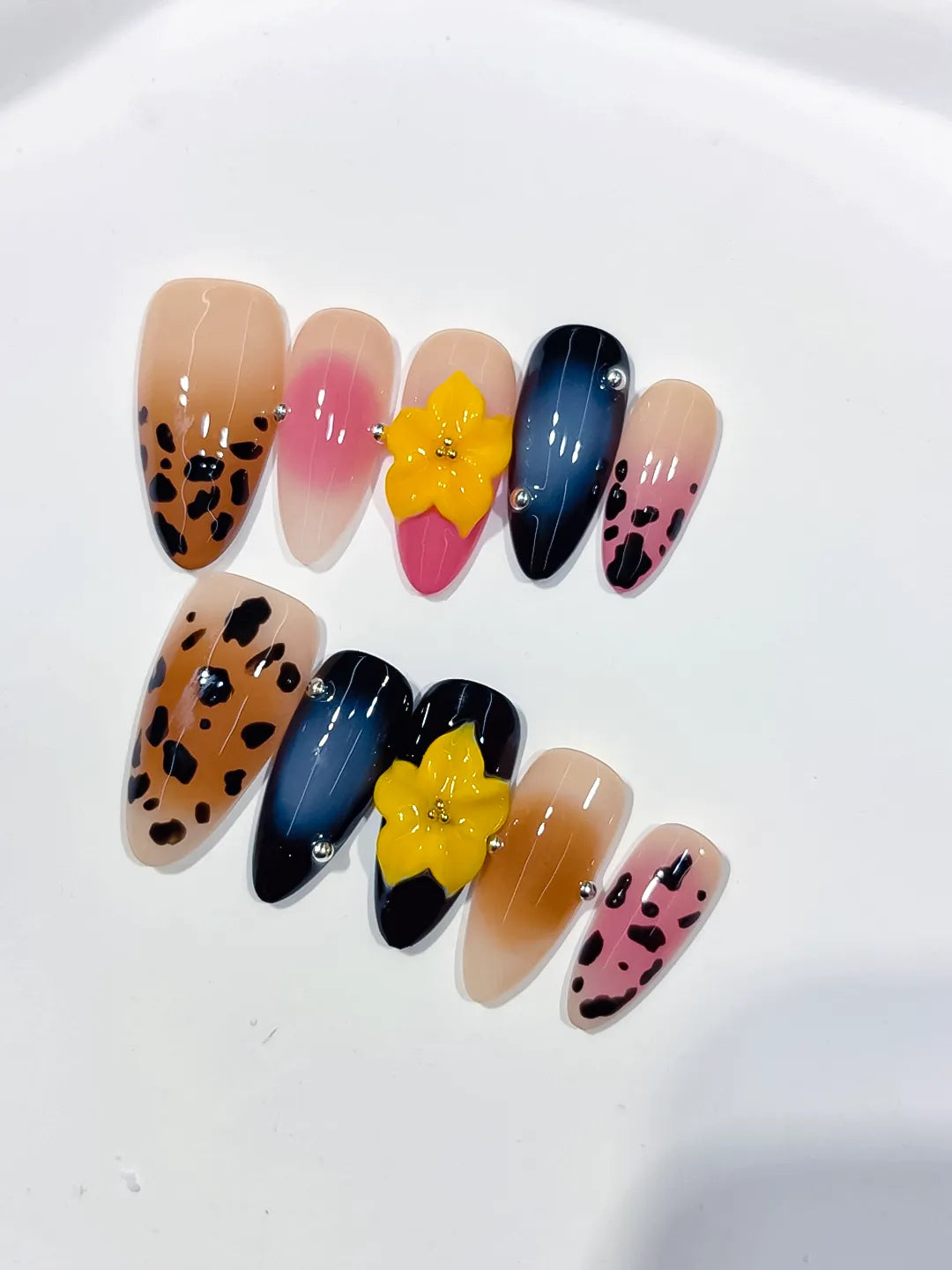 Nude Brown Pink Blue Black Abstract Flower Animal Print press on nails close up