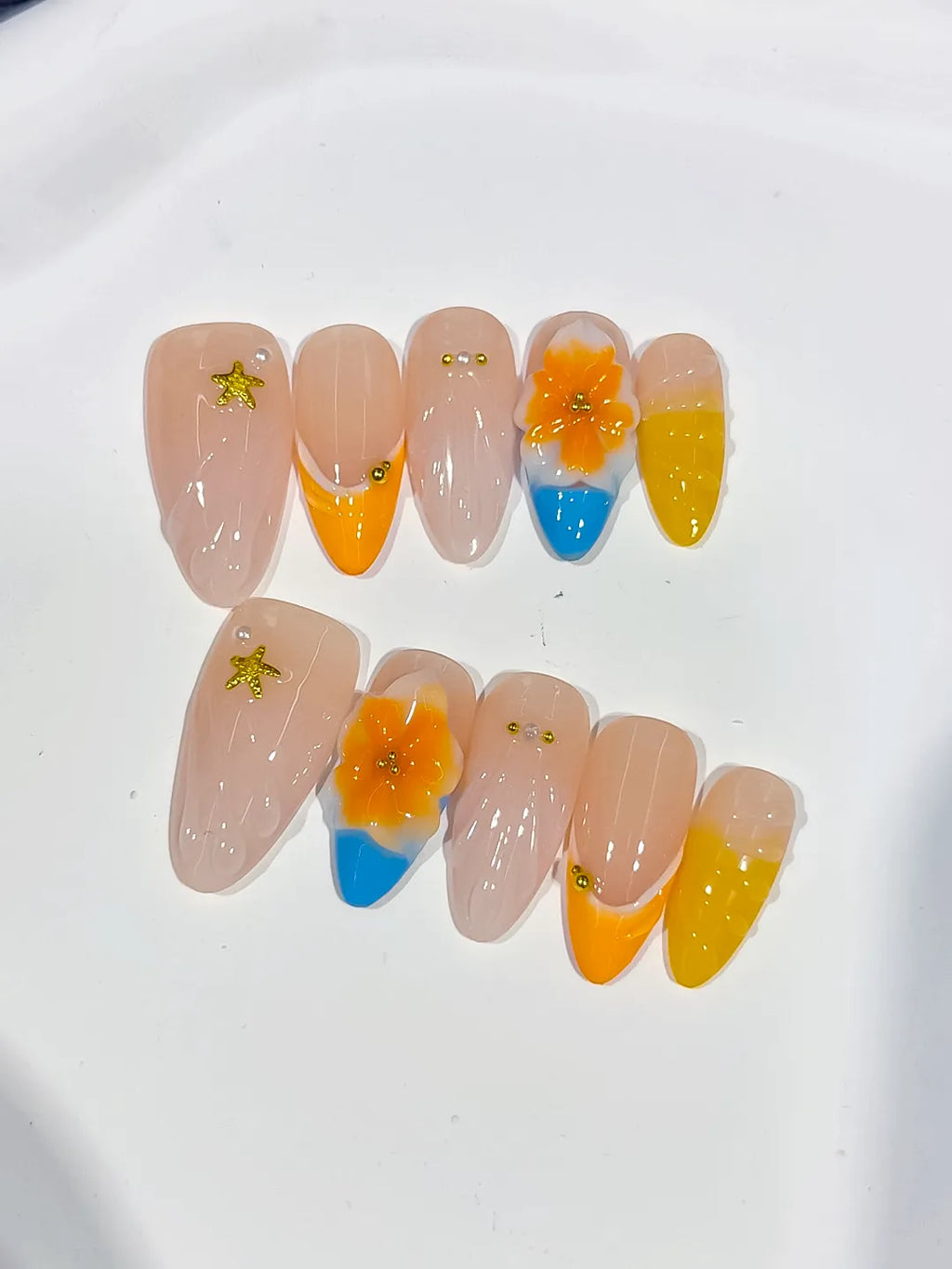 Nude Yellow Orange Blue French tip Flower Star press on nails detail view