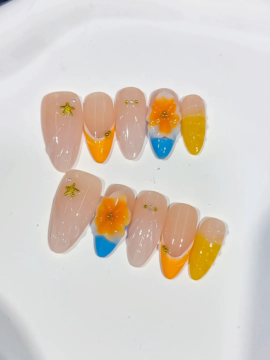 Nude Yellow Orange Blue French tip Flower Star press on nails detail view