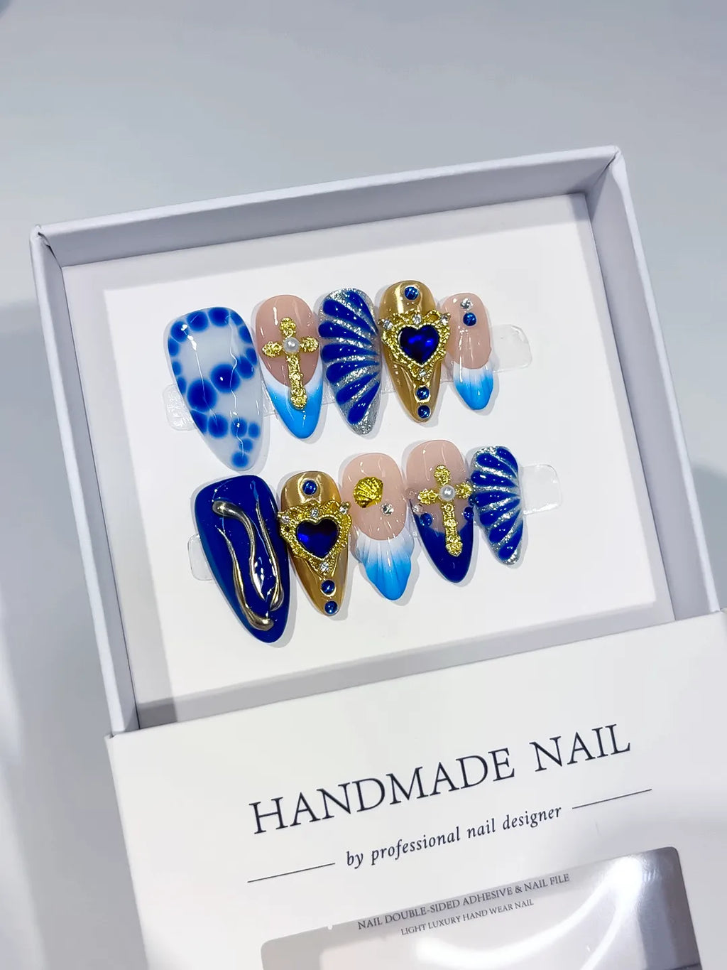 Nude Blue Gold Abstract Heart Shell Metallic Charm press on nails angled view