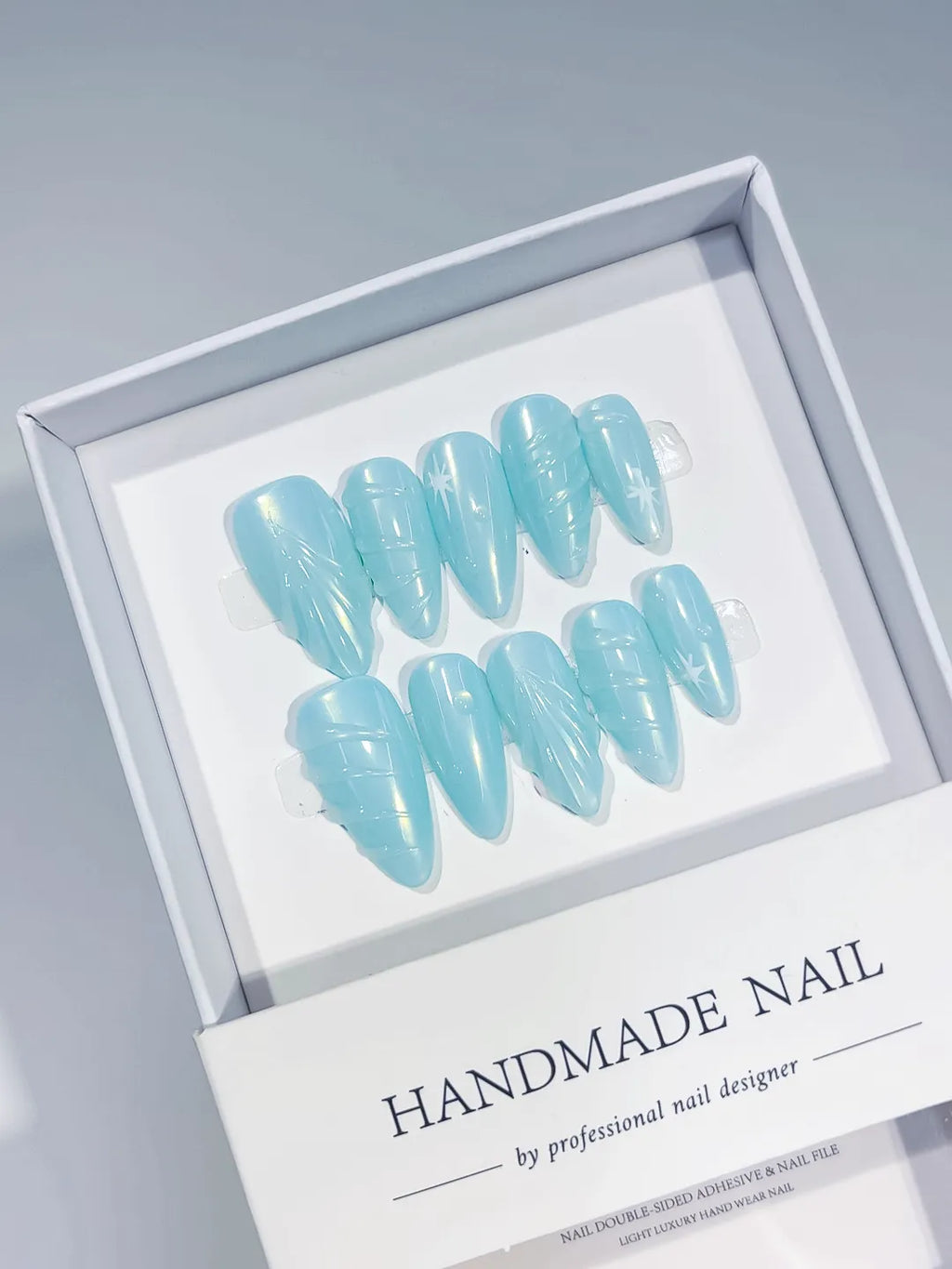 Blue Solid color Line Art press on nails angled view