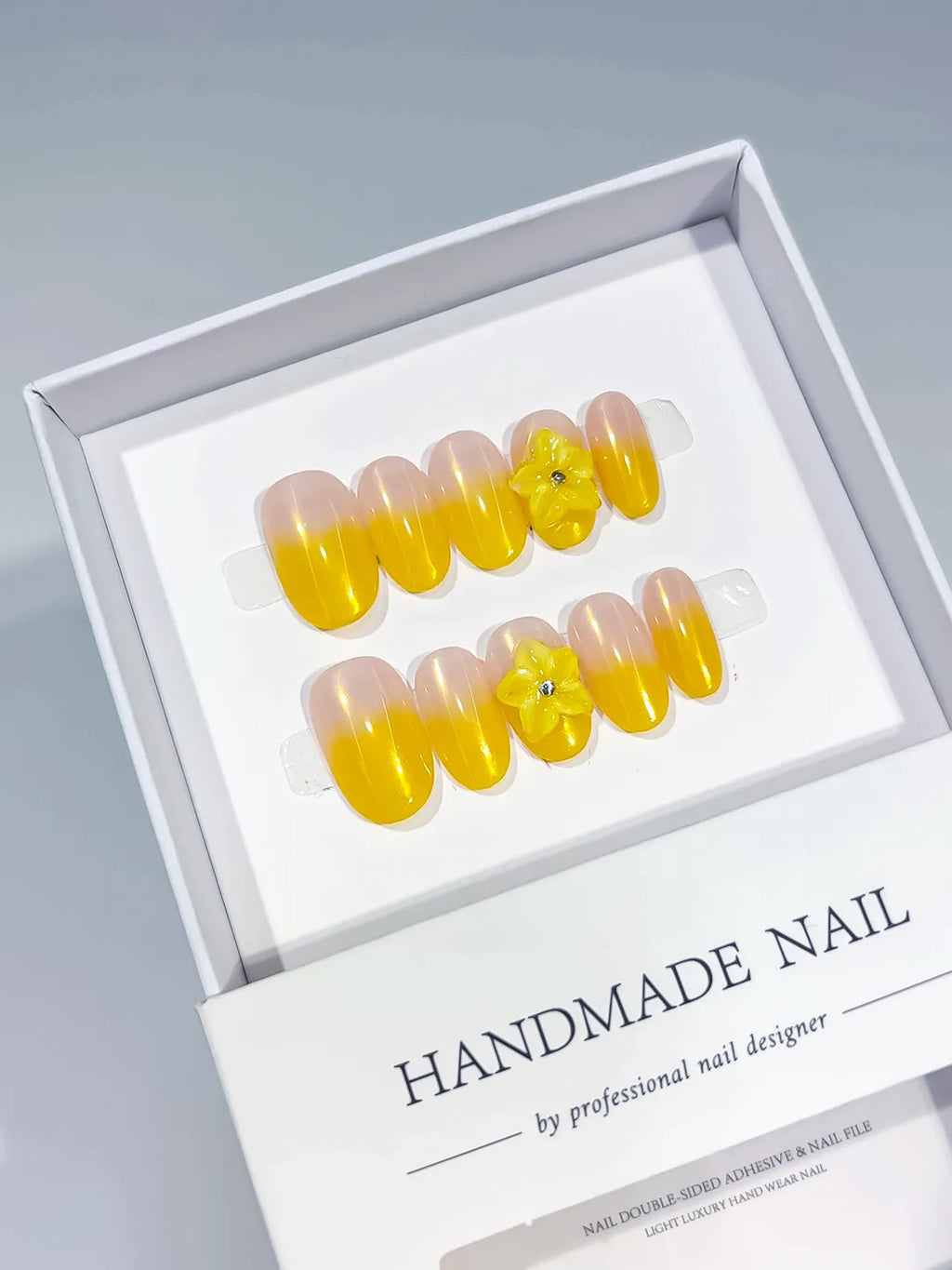 Nude Yellow Ombre Flower press on nails angled view