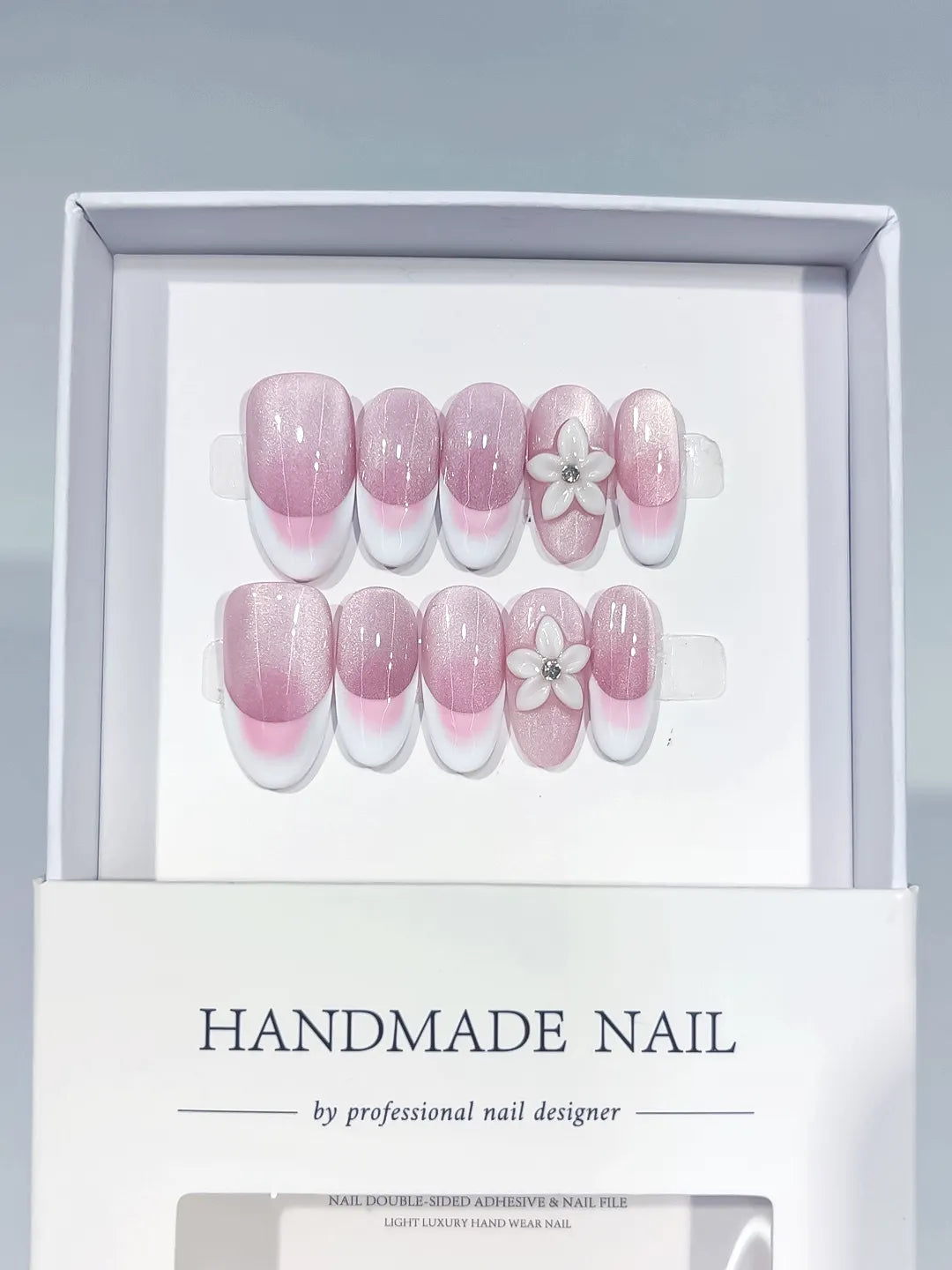 Pink White French tip Flower press on nails angled view