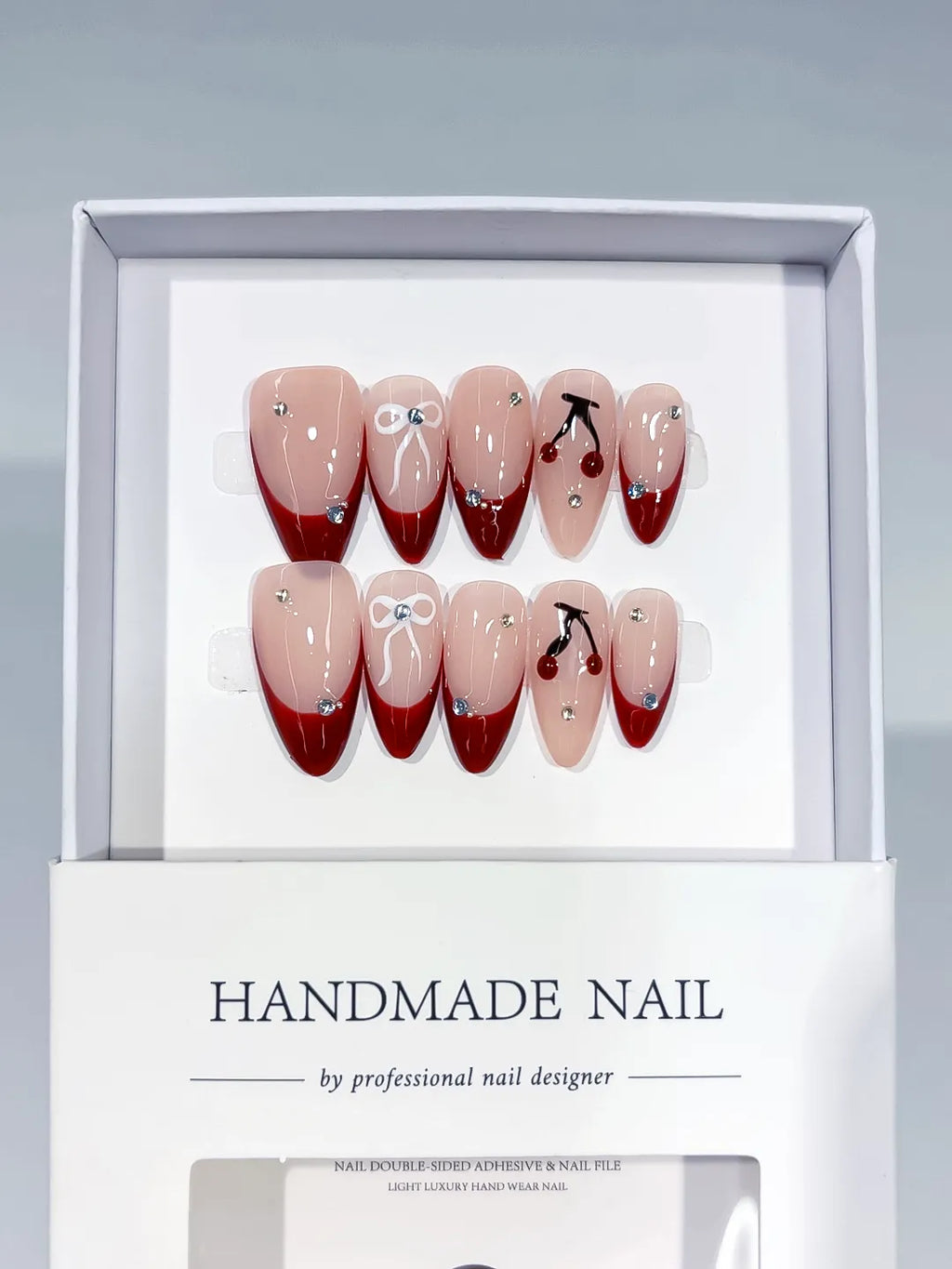 Nude Red French tip Bow Cherry Rhinestone press on nails full set view