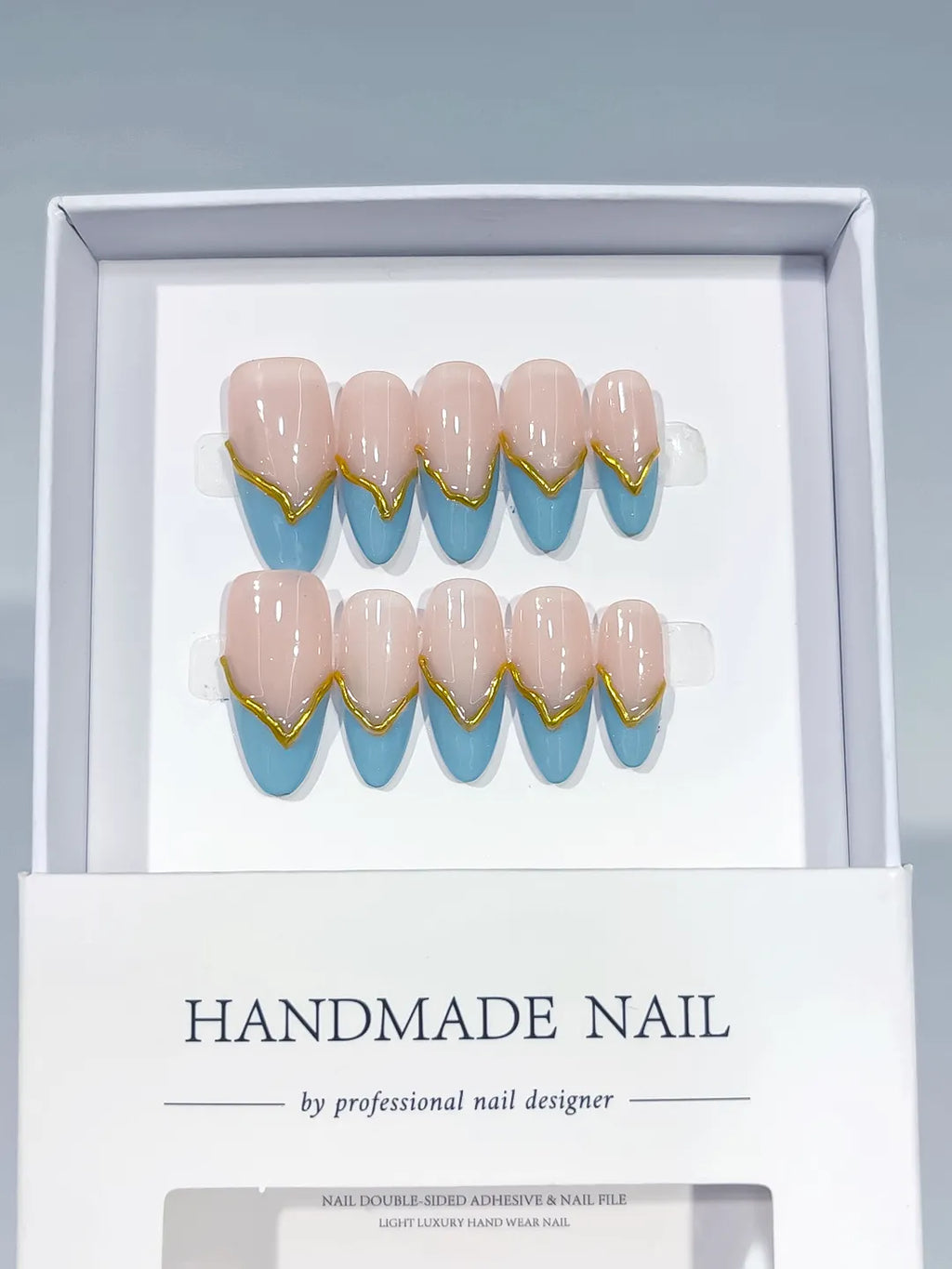 Nude Blue Gold French tip Gold Outline press on nails angled view