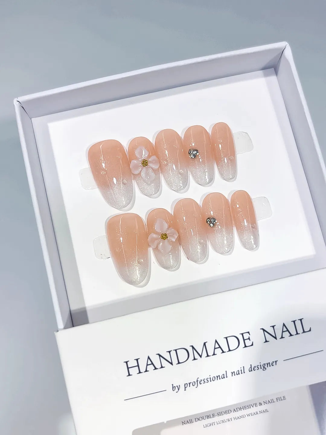 Nude White Silver Ombre Flower Rhinestone press on nails angled view