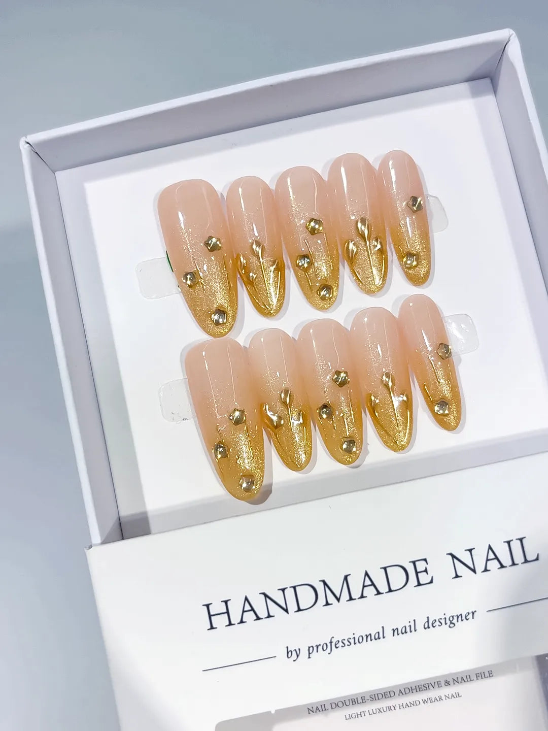 Nude Gold Glitter Gold Stud Metallic Accent press on nails angled view