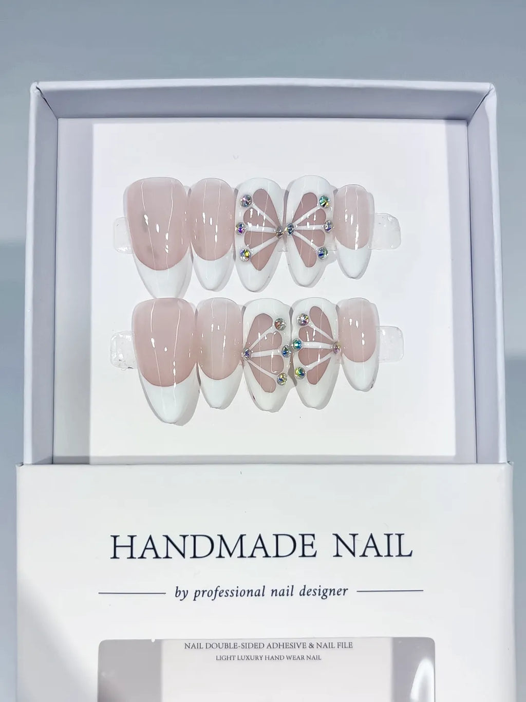 Nude White French tip Petal Rhinestone press on nails angled view