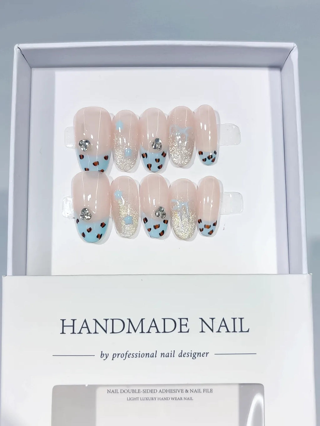 Nude Blue Silver French tip Animal Print Glitter Rhinestone press on nails full set view