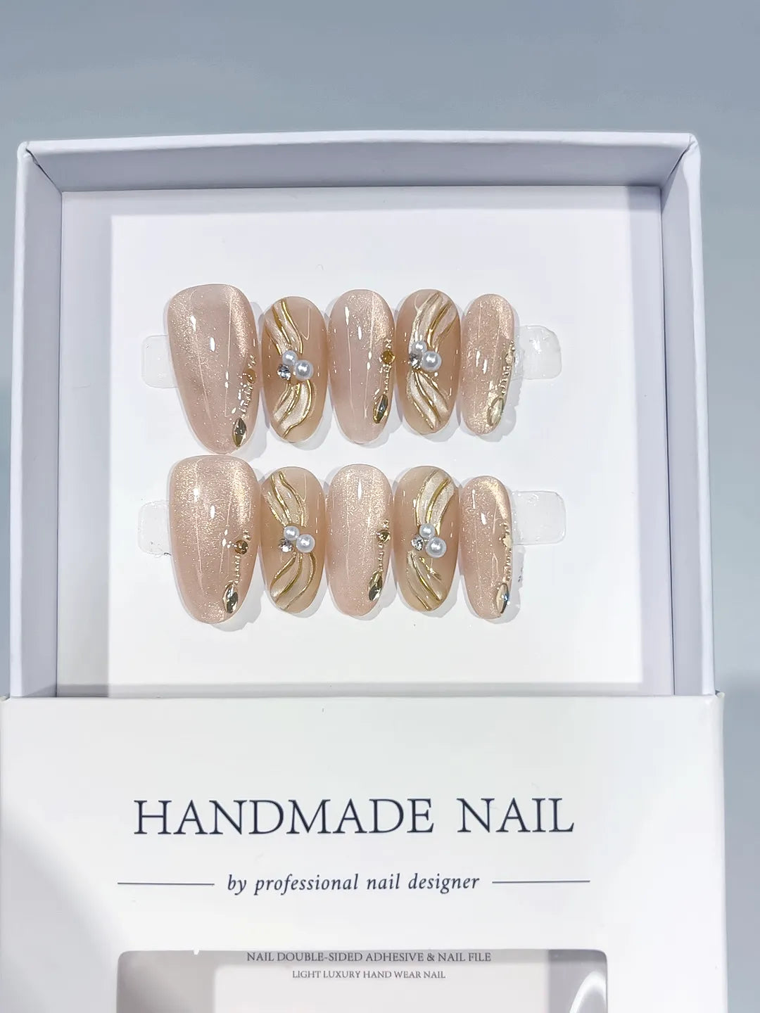 Nude Gold Silver Glitter Pearl Metallic Swirl press on nails angled view