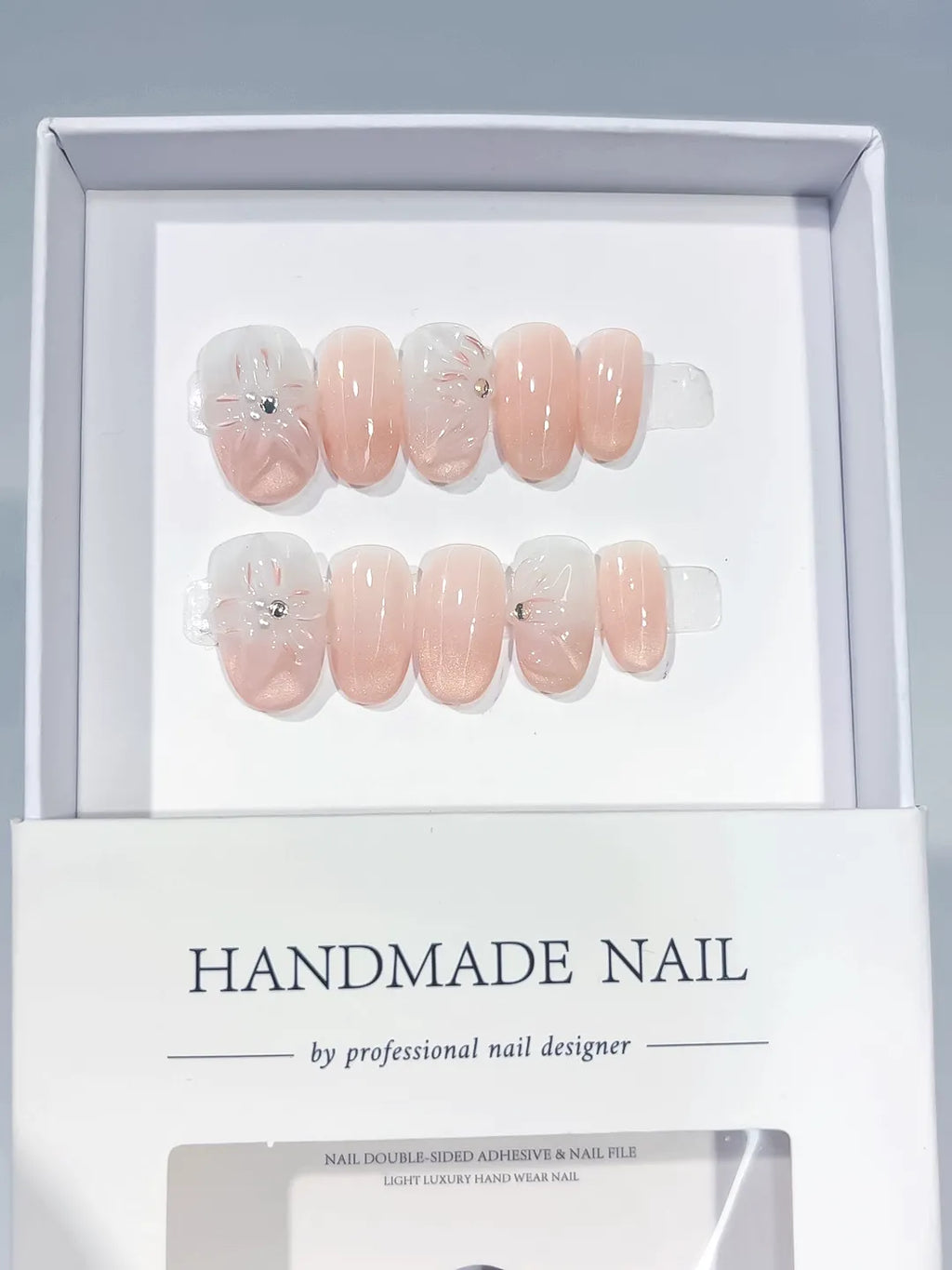 Nude White Holographic Flower Rhinestone press on nails angled view