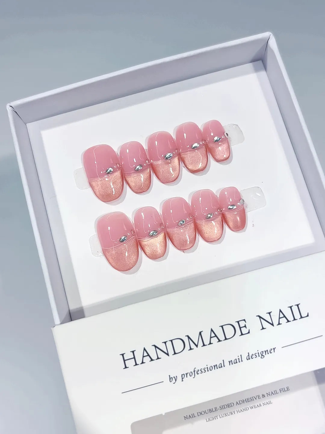 Pink Gold Silver Metallic Metal Stud press on nails angled view