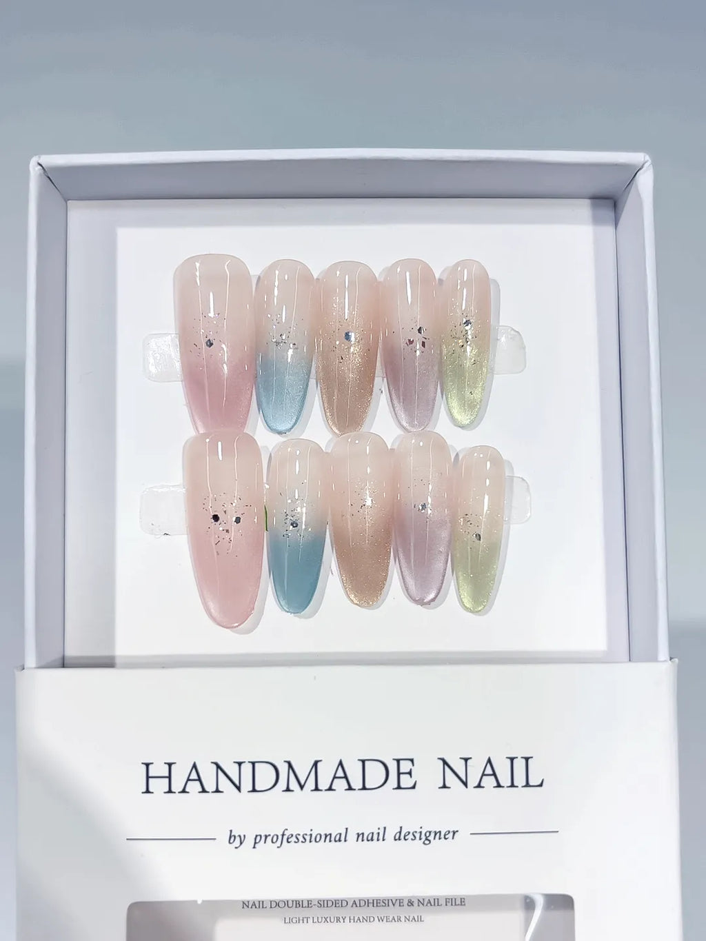 Pink Blue Yellow Multicolor Ombre Rhinestone press on nails angled view